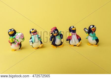 Tyumen, Russia-february 15, 2023: Kinder Surprise Penguins. Kinder Surprise Toy. Sweet Gift. Hobby. 