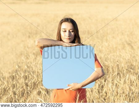Young Woman In The Wheat Field, Holding Mirror Glass Where Reflected The Blue Sky. Meditation, Menta