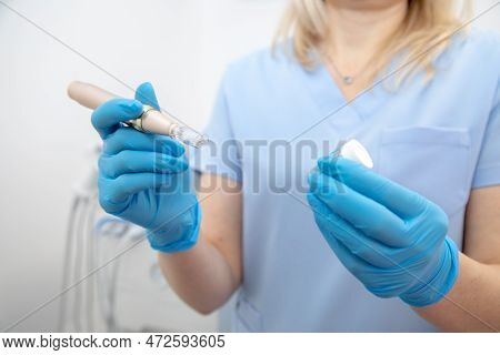 Unrecognizable Female Doctor In Uniform Hold Dermapen, Mesotherapy Technology Syringe. Beauty Proced