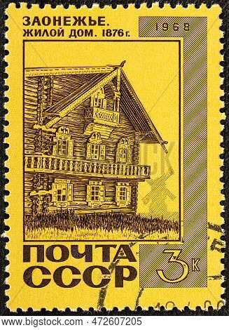 Ussr - Circa 1968: A Stamp Printed In The Ussr, Shows Old Wooden House 1876 In Northern Russian Vill