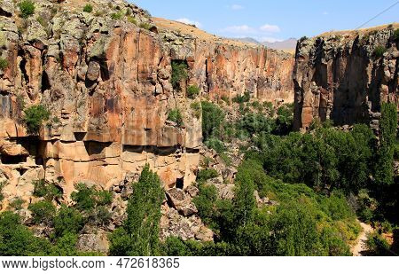 Majestic Rocks And Green Forest In The Gorge In The Ihlara Valley In Central Anatolia, Cappadocia, T