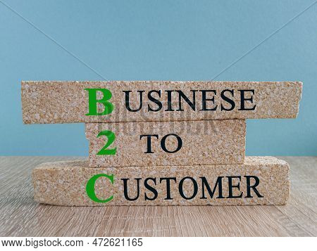 B2c Business To Customer Symbol. Concept Words 'b2c - Business To Customer' On Brick Blocks On A Bea