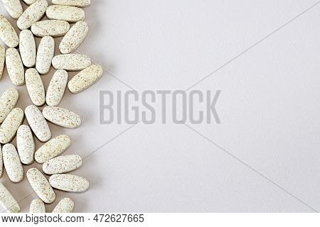 The Oval Beige Medicines With Spots. Vitamin Complex For Healthy Hair And Nails. Copy Space For Text