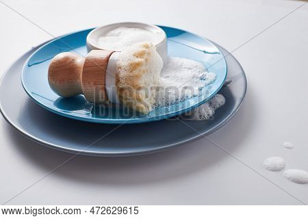 Solid Dish Washing Soap, Covered With Foam. Zero Waste Lifestyle. Dishwashing Pile Of Plates With Fo