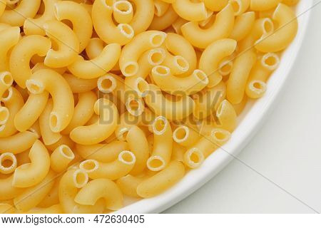 Background Of Uncooked Noodles. Texture Of Dry Vermicelli. Raw Pasta. Bunch Of Raw Pasta