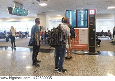 November 18, 2022, Buenos Aires, Argentina: People Looking At Flight Status Information Screens In T