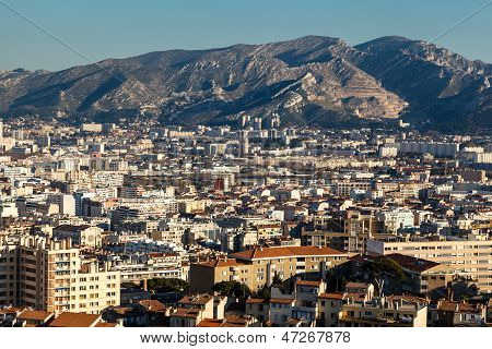 Aerial View Of Marseille City And Mountains In Background, France