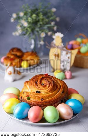 Craffin (cruffin) With Raisins And Candied Fruits. Traditional Easter Bread Kulich And Painted Eggs 