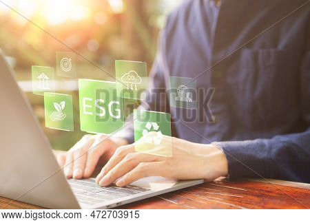 Esg Environmental Social Governance Investment Business Concept. Businessman Use A Computer To Analy