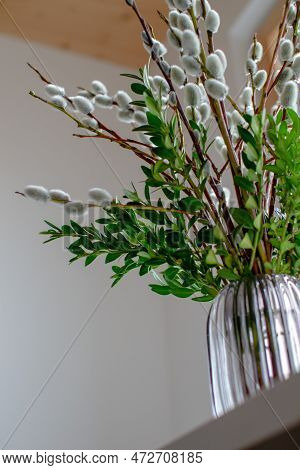 Bottom View Of A Vase Filled With Willow And Boxwood