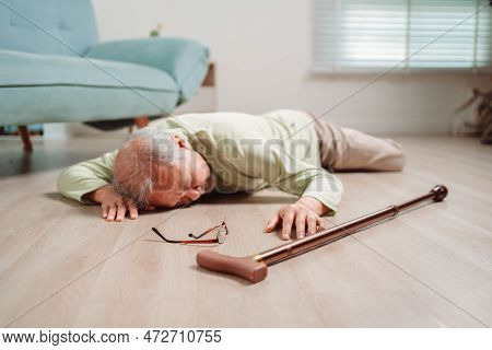 Asian Senior Man Falling On The Ground With Walker In Living Room At Home. Elderly Older Mature Male