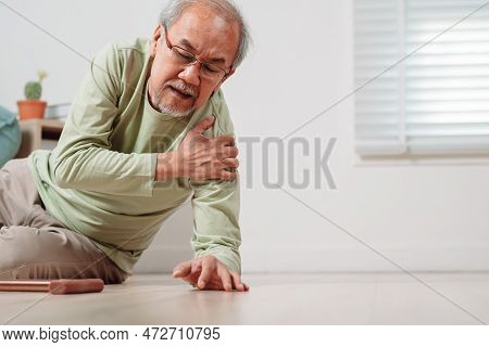 Asian Senior Man Falling On The Ground With Walker In Living Room At Home. Elderly Older Mature Male