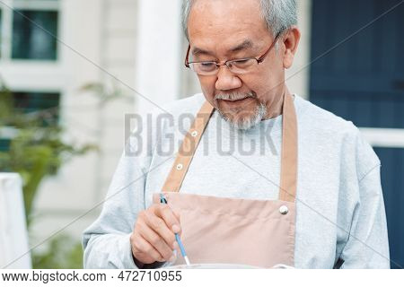 Asian Caregiver Helping Senior Male From Falling On The Ground. Older Elderly Man Patient Having Acc