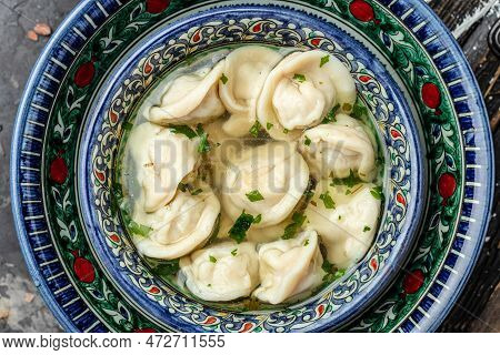 Dumplings In The Soup Chuchvara Banner, Menu, Recipe Place For Text, Top View. Uzbek Cuisine.