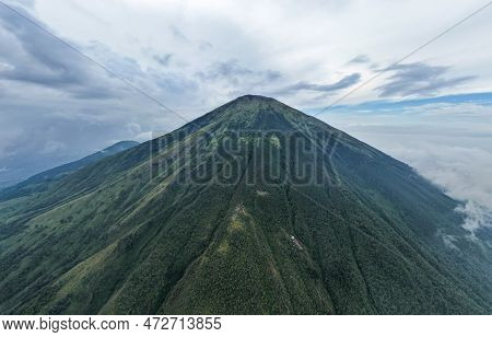 Aerial View Of Mount Sindoro In Indonesia With Noise Cloud. High Quality Photo. Selective Focus. Jav