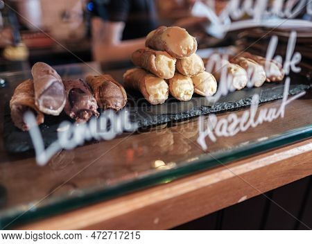 Delicious Cannoli Pastries For Sale In A Trendy Cafe, Deli Or Bakery