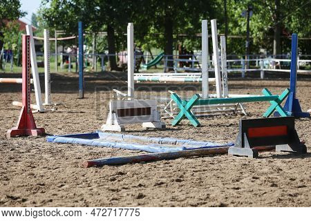 Show Jumping Poles Obstacles, Barriers, Waiting For Riders On Show Jumping Training. Horse Obstacle 