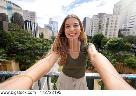 Young Beautiful Brazilian Woman With Stylish Wears Takes Self Portrait In Sao Paulo, Brazil