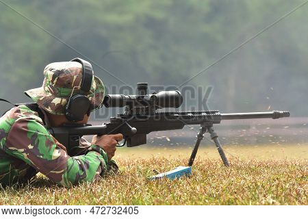 Jakarta, Indonesia - June 26, 2018: Soldier Aiming Target Using Spr-4 Part 2