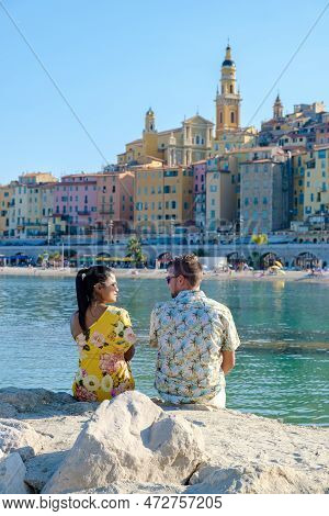 Menton France, Couple Men And Woman On Vacation At The Cote D Azur France, View On Old Part Of Mento