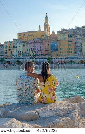 Menton France, Couple Men And Woman On Vacation At The Cote D Azur France, View On Old Part Of Mento