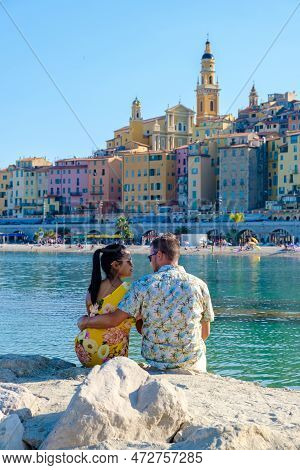 Menton France, Couple Men And Woman On Vacation At The Cote D Azur France, View On Old Part Of Mento