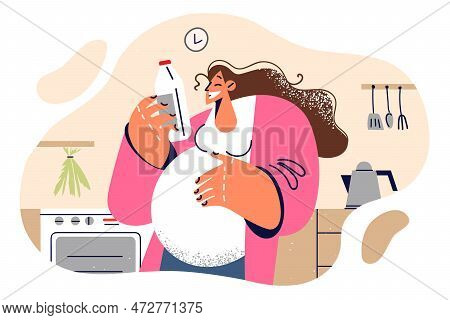 Pregnant Woman Is Preparing For Breakfast To Read Composition Milk, Wanting To Take Only Healthy Foo