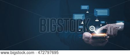 Businessman Hold Laptop And Touch Chat Bot Chat With Ai, Artificial Intelligence, System Artificial 