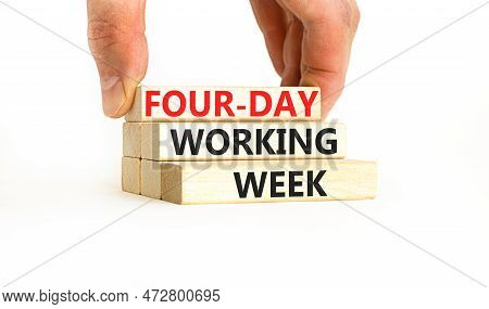 Four-day Working Week Symbol. Concept Words Four-day Working Week On Wooden Block On A Beautiful Whi