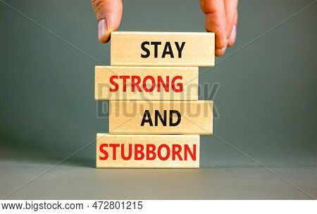 Stay Strong And Stubborn Symbol. Concept Words Stay Strong And Stubborn On Wooden Block. Beautiful G