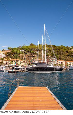 Porto Azzurro Island Of Elba Italy - 19 September 2021 Cityscape Of Harbor Of Porto Azzurro