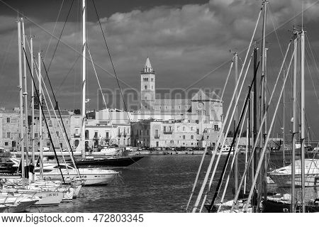 Trani, Italy - April 29, 2019: Cathedral San Nicola Pellegrino In Trani, Italy With Harbor View.