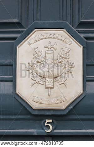 21 February 2023 Lisbon, Portugal: Embassy Of France - Coat Of Arms Of France On The Front Door To T
