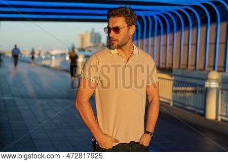 Urban Style Guy With Casual Clothes Walk In Tampa City. Portrait Of Attractive Man With Casual Cloth