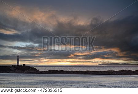 Beautiful Sunset On The Beach Of Los Caños De Meca With The Background Of The Trafalgar Lighthouse, 