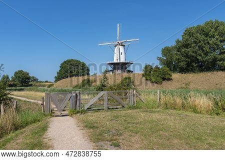 Windmill De Koe At The Former Bastion In Veere. Veere Is A City In The Province Of Zeeland In The Ne