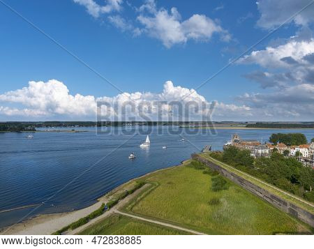 Aerial View With View Over Veerse Meer In Front Of Veere. Veere Is A City In The Province Of Zeeland