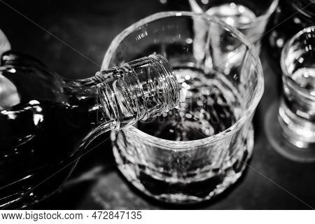 Red Strong Alcohol Drinks, Hard Liquors, Spirits And Distillates Iset In Glasses