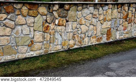 Retaining Walls And Terraces With Trellises And Roses. Rectangular Trimmed Hedge Of Boxwood On The R