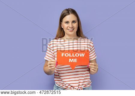 Portrait Of Pretty Cute Adorable Blond Woman Blogger Wearing Striped T-shirt Holding Red Card With F
