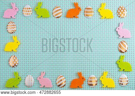 Colorfull Eggs Andl Rabbits On Blue Background