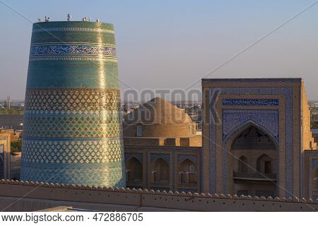 Khiva, Uzbekistan - September 06, 2023: The Ancient Minaret Of Kalta-minor And The Portal Of Muhamma