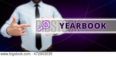 Sign Displaying Yearbook. Business Concept Publication Compiled By Graduating Class As A Record Of T