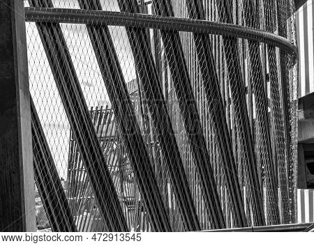 A Metal Fence At The Light Rail Station In Seatac, Wshington.