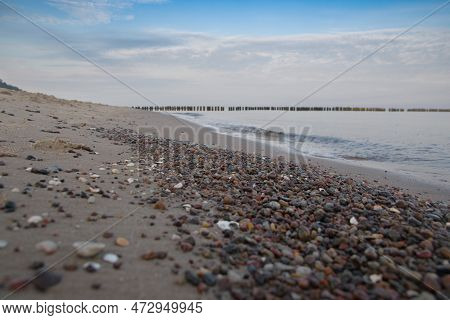 Breakwater On The Beach Of The Baltic Sea Near Rewal. Poland