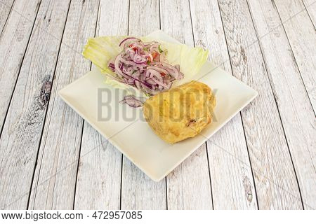 Papa Rellena Is A Typical Peruvian Dish Made With A Potato Dough Stuffed With Meat, Onion, Egg, Oliv