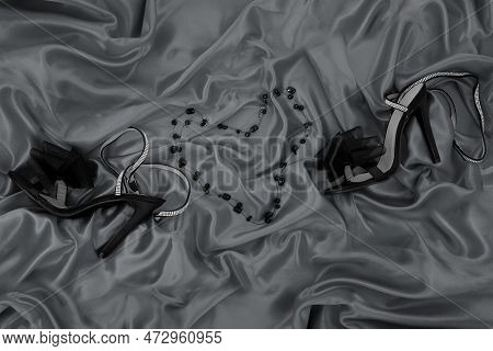 High Heel Shoes  On A Gray Background