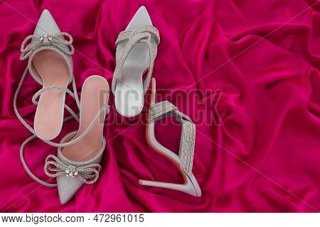 High Heel Shoes  On A Pink  Background