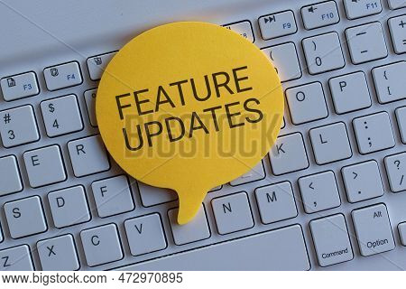 Top View Image Of Keyboard And Speech Bubble With Text Feature Updates. Technology Concept