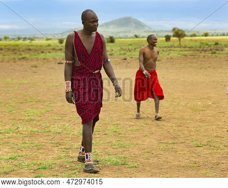Africa, Kenya, May, 2016 - Masai Tribe Men In Traditional Outfits Before The Football Match In Kenya